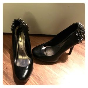 Spiked high heels